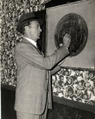 Gary Cooper playing darts