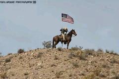 Flag Raised on Bundy Ranch by Cowboy