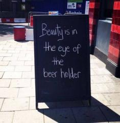 Beauty is in the eye of the beer holder sign