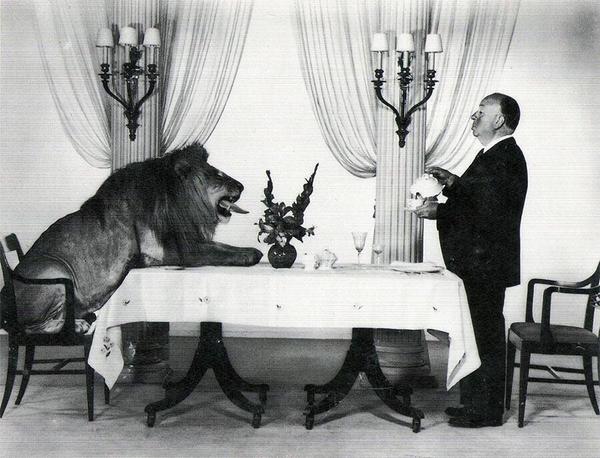 Alfred Hitchcock serving tea to MGMs  Leo the Lion in 1958
