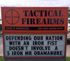 Defending our nation with an iron fist does not involve a five iron -  tactical fire arms sign