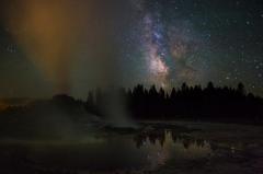 Yellowstone Wyoming Steaming Geyser and Milky Way
