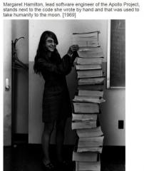 Margaret Hamilton lead software engineer of the Apollo Project inspects her code