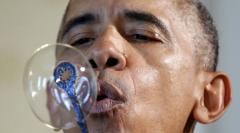 The Man Child President - Obama blowing bubbles while the world burns