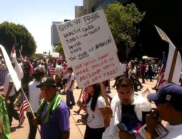 Give us FREE STUFF or we will shoot police in Arizona-  Illegal alien sign in protest