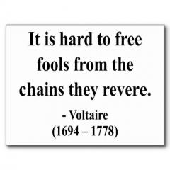 It is hard to free fools from the chains they revere Voltaire quote