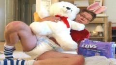 Democrat Senator from Minnesota Al Franken Posing as a Baby In Diapers