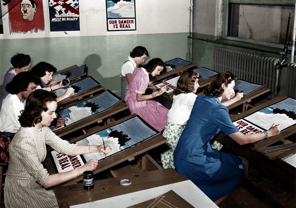 Women painting WWII propaganda posters NY 1942