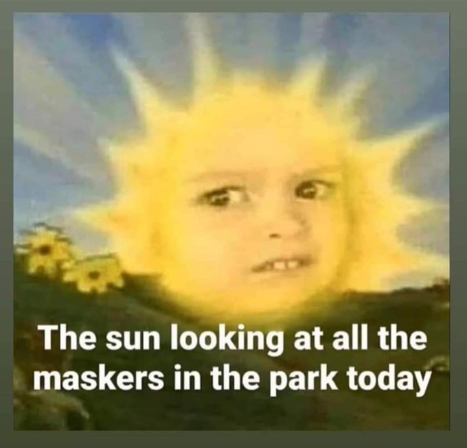 The sun looking at all of the maskers in the park today