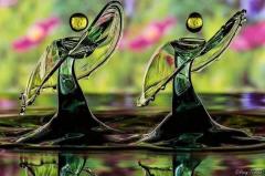 Two water droplets caught dancing together by high speed camera