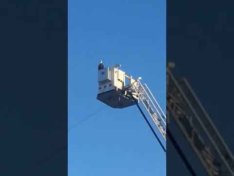 WATCH: Eagle lands on 9/11 aerial ladder display