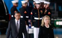Oliar and Hitlery In Front of the Coffins of the Deceased from Benghazi