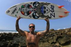 Jay-Adams-North-Shore-Hawaii-Holding-a-Vercelli-surfboard-with-Vercelli-Art-on-it-photo-Hesham