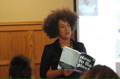 Fake Black Woman Spokane NAACP leader Rachael Dolezal teaching black people how to be black