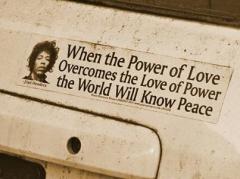 Jimi Hendrix power of love overcomes love of power peace quote