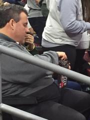 Chris Christie Pouring small MMs into large MMs