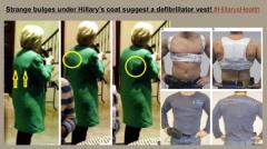 Strange bulges under Hillarys coat suggest a defibrillator vest