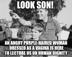 An angry purple haired woman dressed like a vagina lecturing us on human dignity