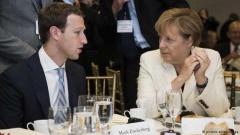 Mark Zuckerberg chumming it up with Angela Merkle