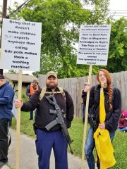 Protest Signs against children and liberals working to abolish the 2nd amendment