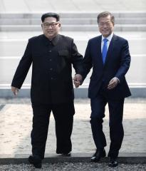 The Trump Effect - When North and South Korea come together holding hands
