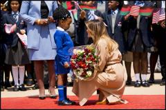 Melania Trump receives flowers in Malawai