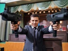 President of Ukraine from his acting days holding guns looking like the tough guy HE IS AN ACTOR