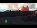 Aerial Iceland volcano footage: Lava fountains, huge smoke clouds